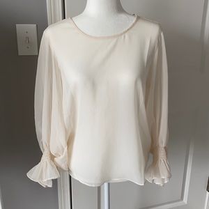 Brand new sheer cream top